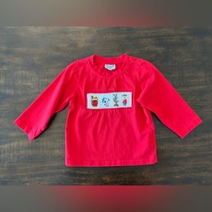 Toddler boy long sleeve smocked Charlie Brown shirt.
